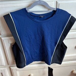 BNWT Michi cruise crop tank top size medium retails $ 125... get a good deal